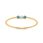 Load image into Gallery viewer, blue-topaz-3-stone-bezel-delicate-ring-in-yellow-gold-FD9412RORGICBLTO-NL-YG.jpg
