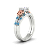 Load image into Gallery viewer, celtic-cushion-cut-blue-topaz-wedding-ring-set-in-white-gold-fdens2255cugicbltoangle2-nl-wg-ws1.jpg