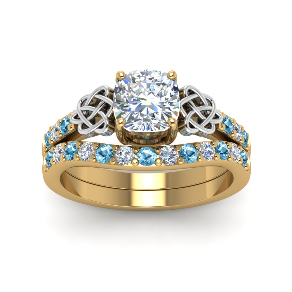 celtic-cushion-cut-diamond-wedding-ring-set-with-blue-topaz-in-yellow-gold-FDENS2255B1CUGICBLTOANGLE5-NL-YG_141d92dd-70fe-49d9-b98c-7010e7dc9ac7?v=1757065045