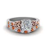 Load image into Gallery viewer, celtic-cushion-cut-diamond-wedding-ring-set-with-orange-sapphire-in-white-gold-FDENS2255B1CUGSAOR-NL-WG_6b510255-d1a2-4ce4-ae1f-0bcfc795e490?v=1757065044

