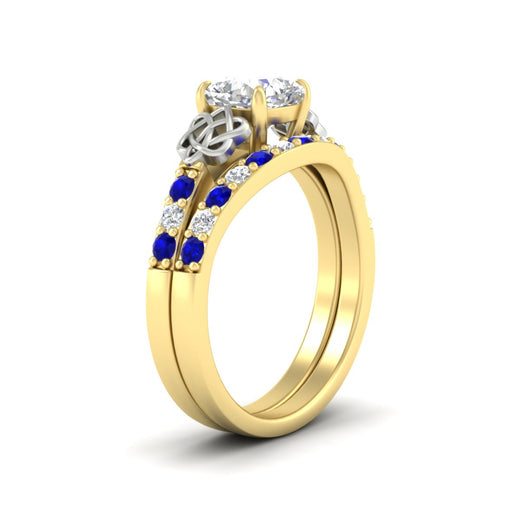 celtic-cushion-cut-sapphire-wedding-ring-set-in-yellow-gold-fdens2255cugsablangle2-nl-yg-ws1.jpg