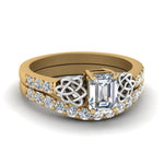 Load image into Gallery viewer, celtic-emerald-cut-diamond-wedding-ring-set-in-yellow-gold-FDENS2255B1EM-NL-YG_c3d4c2c0-f713-4f36-a9f9-8651ea322159?v=1757056978
