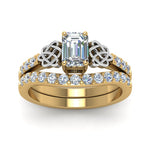 Load image into Gallery viewer, celtic-emerald-cut-diamond-wedding-ring-set-in-yellow-gold-FDENS2255B1EMANGLE5-NL-YG_143bddc0-aee5-461b-85dd-62e8e16ec563?v=1757056978
