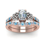 Load image into Gallery viewer, celtic-emerald-cut-diamond-wedding-ring-set-with-blue-topaz-in-rose-gold-FDENS2255B1EMGICBLTOANGLE5-NL-RG_5b2415c3-26dd-40c6-9bc0-de7cffe0075c?v=1757056978
