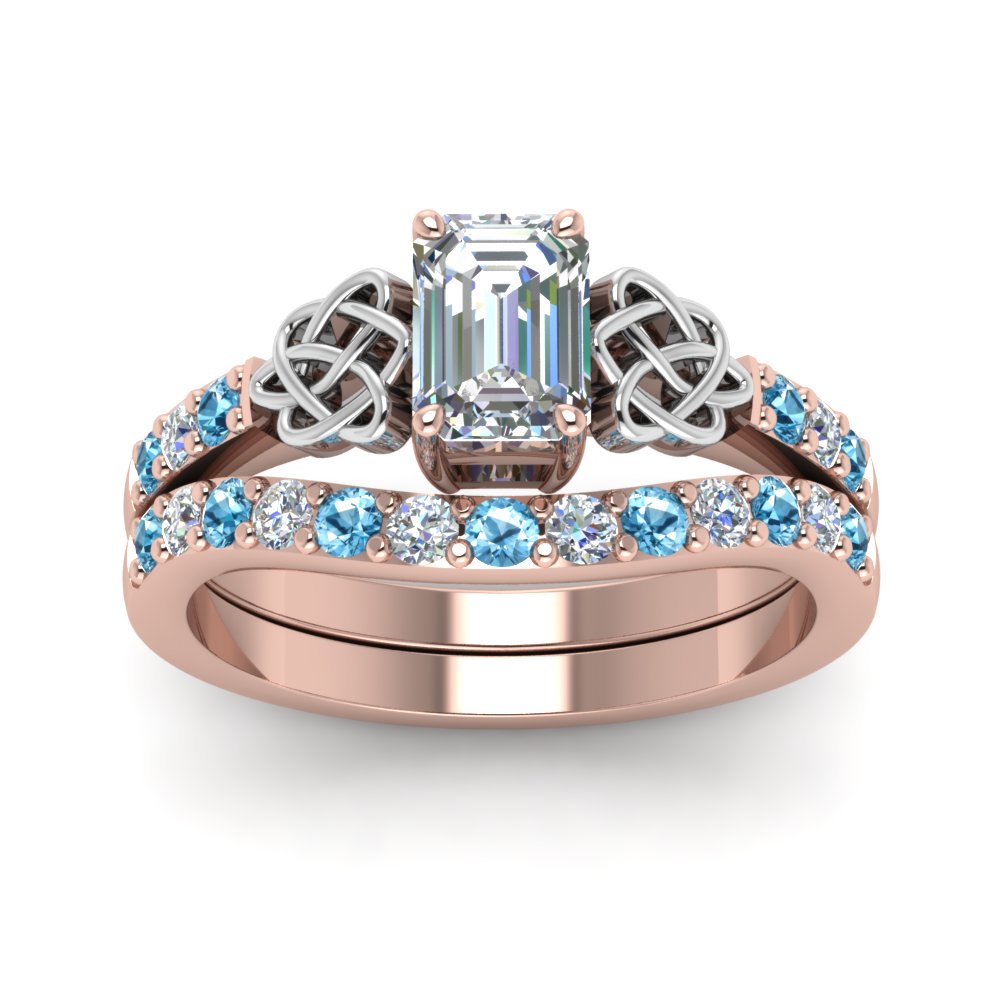 celtic-emerald-cut-diamond-wedding-ring-set-with-blue-topaz-in-rose-gold-FDENS2255B1EMGICBLTOANGLE5-NL-RG_5b2415c3-26dd-40c6-9bc0-de7cffe0075c?v=1757056978