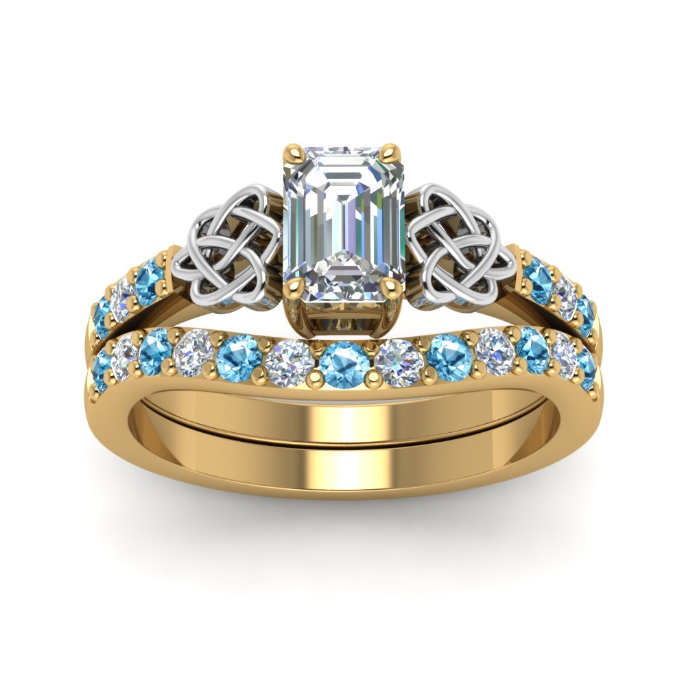 celtic-emerald-cut-diamond-wedding-ring-set-with-blue-topaz-in-yellow-gold-FDENS2255B1EMGICBLTOANGLE5-NL-YG_60793cb7-103b-4246-9875-84d16c51d12a?v=1757056978