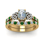 Load image into Gallery viewer, celtic-emerald-cut-diamond-wedding-ring-set-with-emerald-in-yellow-gold-FDENS2255B1EMGEMGRANGLE5-NL-YG_96b3b5d0-81ee-47cf-9443-d912bed75370?v=1757056978
