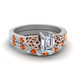 Load image into Gallery viewer, celtic-emerald-cut-diamond-wedding-ring-set-with-orange-sapphire-in-white-gold-FDENS2255B1EMGSAOR-NL-WG_8bbb5b6e-ee54-4422-99ad-552adfa76267?v=1757056977
