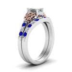Load image into Gallery viewer, celtic-emerald-cut-diamond-wedding-ring-set-with-sapphire-in-white-gold-FDENS2255B1EMGSABLANGLE2-NL-WG_58261fbb-fd5c-4a65-9cdb-10888716d125?v=1757056977

