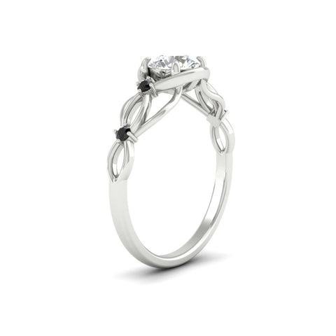 celtic-infinity-round-cut-black-diamond-engagement-ring-in-white-gold-fdenr11611rorgblackangle2-nl-wg.jpg?v=1764671682