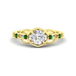 Load image into Gallery viewer, celtic-infinity-round-cut-emerald-engagement-ring-in-yellow-gold-fdenr11611rorgemgrsleep-nl-yg_62401da2-db72-4d26-8c19-21820c06658a.jpg?v=1764671694
