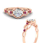 Load image into Gallery viewer, celtic-infinity-round-cut-pink-sapphire-engagement-ring-in-rose-gold-fdenr11611rorgsadrpiangle3-nl-rg_52a445db-bb25-4cf2-9a15-9998c74907e4.jpg?v=1764671693
