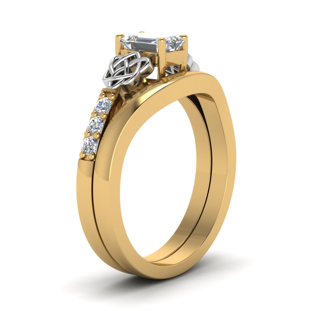 celtic-knot-emerald-cut-diamond-ring-with-plain-band-set-in-yellow-gold-FDENS2255B3EMANGLE2-NL-YG_ad23efc1-2026-4182-93de-10b5f1d5111d?v=1756976829