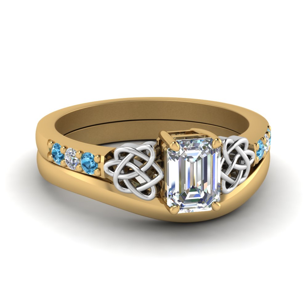 celtic-knot-emerald-cut-diamond-ring-with-plain-band-set-with-blue-topaz-in-yellow-gold-FDENS2255B3EMGICBLTO-NL-YG?v=1756976734