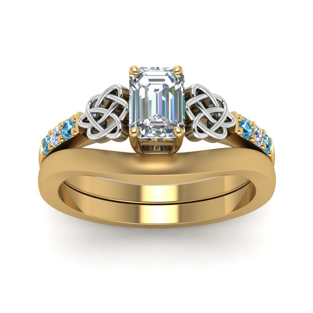 celtic-knot-emerald-cut-diamond-ring-with-plain-band-set-with-blue-topaz-in-yellow-gold-FDENS2255B3EMGICBLTOANGLE5-NL-YG_5399ed53-f497-48ab-86e9-1a14885f7f36?v=1756976829