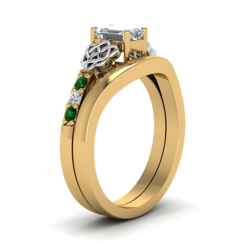 celtic-knot-emerald-cut-diamond-ring-with-plain-band-set-with-emerald-in-yellow-gold-FDENS2255B3EMGEMGRANGLE2-NL-YG?v=1756976733