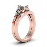 Load image into Gallery viewer, celtic-knot-emerald-cut-diamond-ring-with-plain-band-set-with-orange-sapphire-in-rose-gold-FDENS2255B3EMGSAORANGLE2-NL-RG_96805215-b097-44bc-94a2-27279e36d680?v=1756976829
