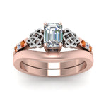 Load image into Gallery viewer, celtic-knot-emerald-cut-diamond-ring-with-plain-band-set-with-orange-sapphire-in-rose-gold-FDENS2255B3EMGSAORANGLE5-NL-RG_ac72c122-8366-4b58-83f4-c35d31e82a03?v=1756976829
