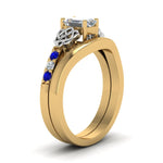 Load image into Gallery viewer, celtic-knot-emerald-cut-diamond-ring-with-plain-band-set-with-sapphire-in-yellow-gold-FDENS2255B3EMGSABLANGLE2-NL-YG?v=1756976733
