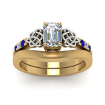 Load image into Gallery viewer, celtic-knot-emerald-cut-diamond-ring-with-plain-band-set-with-sapphire-in-yellow-gold-FDENS2255B3EMGSABLANGLE5-NL-YG?v=1756976733
