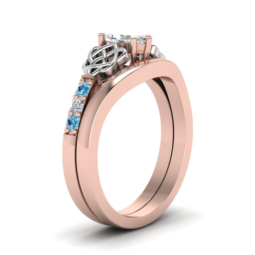 celtic-knot-marquise-cut-diamond-ring-with-plain-band-set-with-blue-topaz-in-rose-gold-FDENS2255B3MQGICBLTOANGLE2-NL-RG?v=1756976751