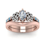 Load image into Gallery viewer, celtic-knot-marquise-cut-diamond-ring-with-plain-band-set-with-blue-topaz-in-rose-gold-FDENS2255B3MQGICBLTOANGLE5-NL-RG_17835fa8-49e9-401c-9ec8-06f2c9bfd60e?v=1756976840
