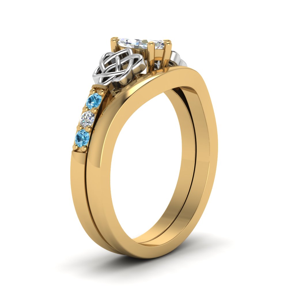 celtic-knot-marquise-cut-diamond-ring-with-plain-band-set-with-blue-topaz-in-yellow-gold-FDENS2255B3MQGICBLTOANGLE2-NL-YG_a024fbec-7469-48b9-b803-fdd32d977ab5?v=1756976841