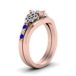 Load image into Gallery viewer, celtic-knot-marquise-cut-diamond-ring-with-plain-band-set-with-sapphire-in-rose-gold-FDENS2255B3MQGSABLANGLE2-NL-RG_0c18e556-f3f9-43a2-ba68-23073c5c0267?v=1756976841
