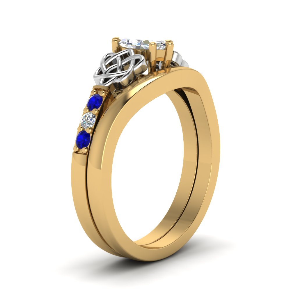 celtic-knot-marquise-cut-diamond-ring-with-plain-band-set-with-sapphire-in-yellow-gold-FDENS2255B3MQGSABLANGLE2-NL-YG_5eca3480-1c44-4fbb-bbed-daede01d8d16?v=1756976841