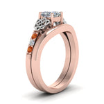 Load image into Gallery viewer, celtic-knot-princess-cut-diamond-ring-with-plain-band-set-with-orange-sapphire-in-rose-gold-FDENS2255B3PRGSAORANGLE2-NL-RG_8c6f54fe-76a6-4fab-863a-e90c963fdbca?v=1756976852
