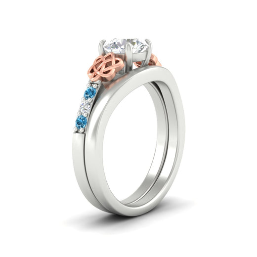 celtic-knot-round-cut-blue-topaz-ring-with-plain-band-set-in-white-gold-fdens2255rogicbltoangle2-nl-wg-ws3.jpg