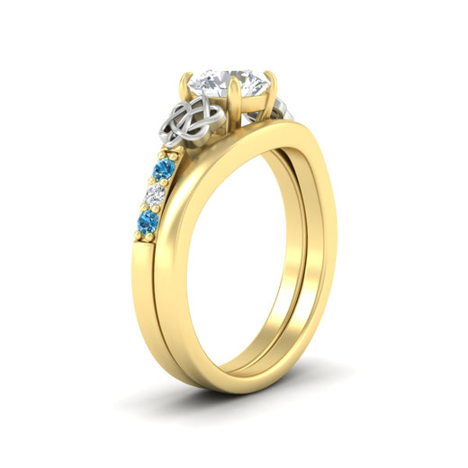 celtic-knot-round-cut-blue-topaz-ring-with-plain-band-set-in-yellow-gold-fdens2255rogicbltoangle2-nl-yg-ws3.jpg