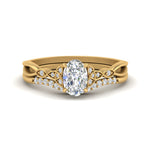Load image into Gallery viewer, celtic-knot-split-oval-shaped-diamond-engagement-ring-in-yellow-gold-FD9609OV-NL-YG
