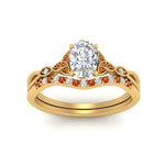 Load image into Gallery viewer, celtic-knot-split-oval-shaped-orange-sapphire-engagement-ring-in-yellow-gold-FD9609OVGSAOR-NL-YG
