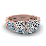 Load image into Gallery viewer, celtic-marquise-cut-diamond-wedding-ring-set-with-blue-topaz-in-rose-gold-FDENS2255B1MQGICBLTO-NL-RG_47bf526b-9acb-4335-bd30-1109ba740093?v=1757056989
