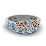 Load image into Gallery viewer, celtic-marquise-cut-diamond-wedding-ring-set-with-blue-topaz-in-white-gold-FDENS2255B1MQGICBLTO-NL-WG_edc5a8bb-b1f4-4346-9522-6aadf368ded2?v=1757056989

