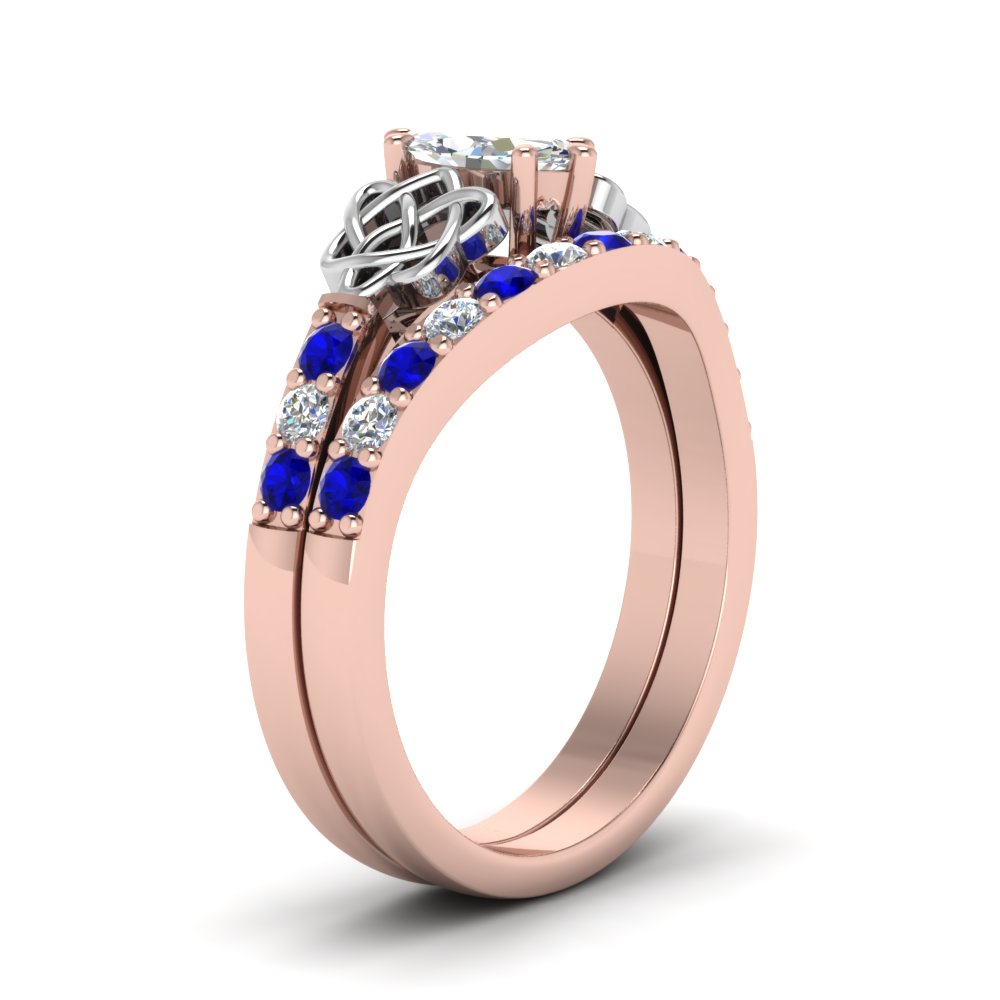celtic-marquise-cut-diamond-wedding-ring-set-with-sapphire-in-rose-gold-FDENS2255B1MQGSABLANGLE2-NL-RG_f1151bef-c2ac-45fd-ac22-998837581599?v=1757056989
