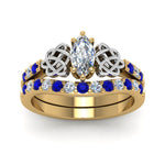 Load image into Gallery viewer, celtic-marquise-cut-diamond-wedding-ring-set-with-sapphire-in-yellow-gold-FDENS2255B1MQGSABLANGLE5-NL-YG_d11c144d-86c6-453d-973d-53dc96f95794?v=1757056989

