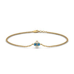 Load image into Gallery viewer, chain-four-daimond-stacking-bracelet-with-blue-topaz-in-FDBRC9628GICBLTOANGLE2-NL-YG
