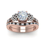 Load image into Gallery viewer, channel-band-cushion-cut-celtic-bridal-set-with-black-diamond-in-rose-gold-FDENS2255B2CUGBLACKANGLE5-NL-RG_9a306e48-4b31-4739-8ead-e23719b6ec0b?v=1756980463
