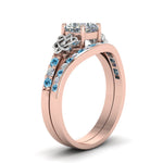 Load image into Gallery viewer, channel-band-cushion-cut-diamond-celtic-bridal-set-with-blue-topaz-in-rose-gold-FDENS2255B2CUGICBLTOANGLE2-NL-RG_d03695d3-3244-4260-b149-12fcbd7fad0a?v=1756980463
