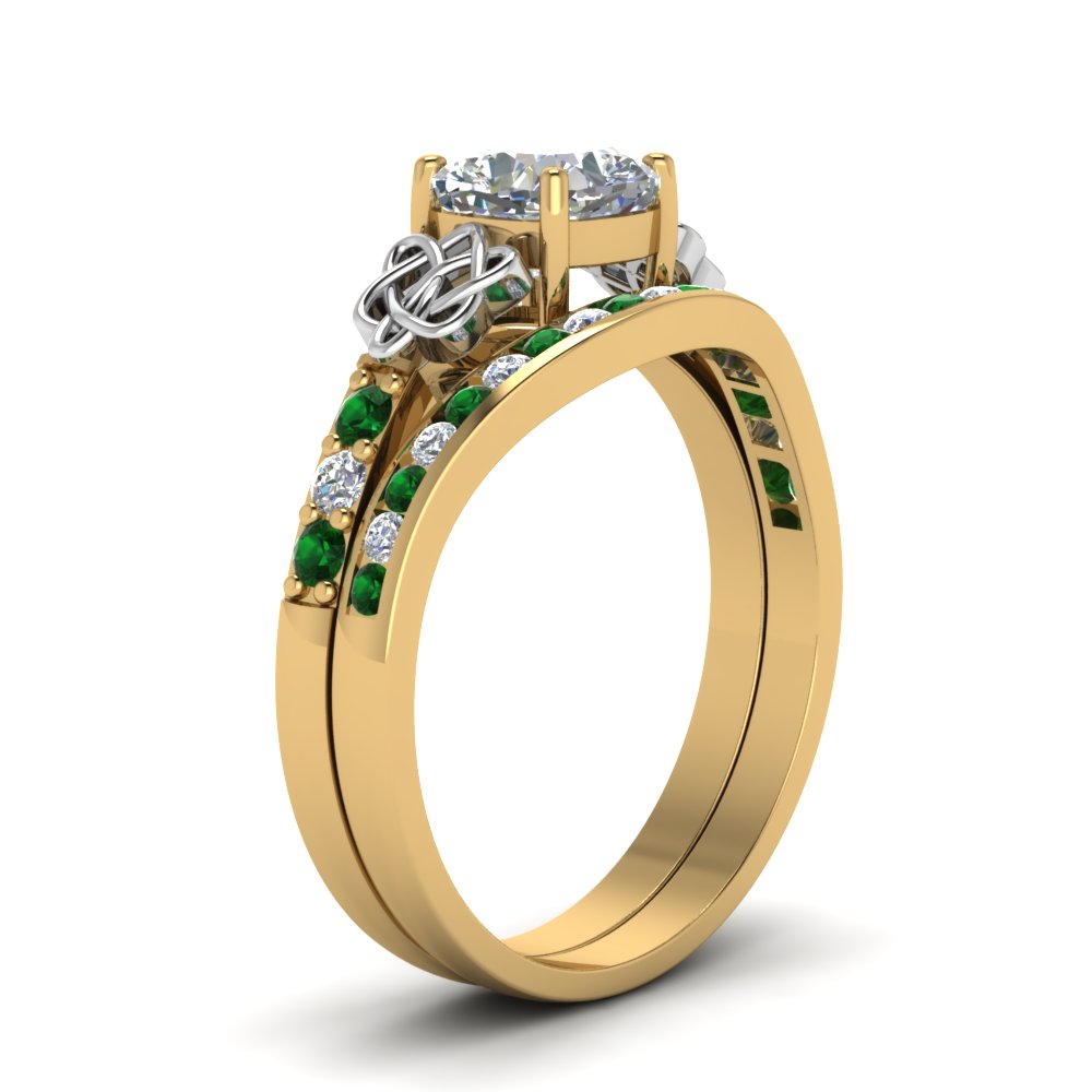 channel-band-cushion-cut-diamond-celtic-bridal-set-with-emerald-in-yellow-gold-FDENS2255B2CUGEMGRANGLE2-NL-YG_446cc9ef-4eb2-4bc5-ae9c-8e5ea8679f46?v=1756980463