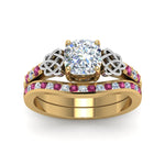 Load image into Gallery viewer, channel-band-cushion-cut-diamond-celtic-bridal-set-with-pink-sapphire-in-yellow-gold-FDENS2255B2CUGSADRPIANGLE5-NL-YG_a43a5be4-0ced-4a32-8dc4-ea60ce2b8836?v=1756980463
