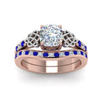 Load image into Gallery viewer, channel-band-cushion-cut-diamond-celtic-bridal-set-with-sapphire-in-rose-gold-FDENS2255B2CUGSABLANGLE5-NL-RG_21310fe8-7348-41d4-8d9f-cff873505d27?v=1756980463
