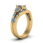 Load image into Gallery viewer, channel-band-emerald-cut-diamond-celtic-bridal-set-with-blue-topaz-in-yellow-gold-FDENS2255B2EMGICBLTOANGLE2-NL-YG

