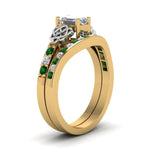 Load image into Gallery viewer, channel-band-emerald-cut-diamond-celtic-bridal-set-with-emerald-in-yellow-gold-FDENS2255B2EMGEMGRANGLE2-NL-YG_44f4302b-f0ad-4a4b-ae9a-55cbd1132db5?v=1756980475
