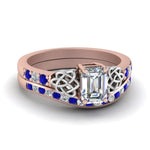 Load image into Gallery viewer, channel-band-emerald-cut-diamond-celtic-bridal-set-with-sapphire-in-rose-gold-FDENS2255B2EMGSABL-NL-RG_a780707b-f788-4ca2-bf09-615410c942d5?v=1756980474
