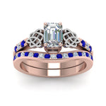 Load image into Gallery viewer, channel-band-emerald-cut-diamond-celtic-bridal-set-with-sapphire-in-rose-gold-FDENS2255B2EMGSABLANGLE5-NL-RG_0e9d58e7-3a35-49d8-9dc5-97a3e7fff803?v=1756980474
