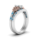 Load image into Gallery viewer, channel-band-marquise-cut-diamond-celtic-bridal-set-with-blue-topaz-in-white-gold-FDENS2255B2MQGICBLTOANGLE2-NL-WG_5b465c54-644e-4e25-a83f-e04223b451fc?v=1756980487
