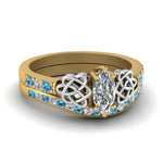 Load image into Gallery viewer, channel-band-marquise-cut-diamond-celtic-bridal-set-with-blue-topaz-in-yellow-gold-FDENS2255B2MQGICBLTO-NL-YG_90ed44ce-5f1a-464a-89a5-47476e21fbaa?v=1756980487
